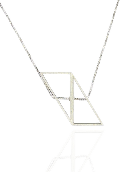 Triangle Morph Necklace in brushed sterling silver, made of two triangles joined at the second largest side that can rotate to shift the shape from triangle to parallelogram.