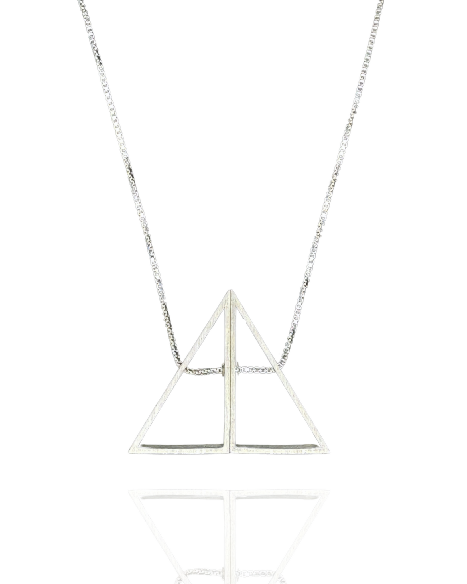Triangle Morph Necklace in brushed sterling silver, made of two triangles joined at the second largest side that can rotate to shift the shape from triangle to parallelogram.